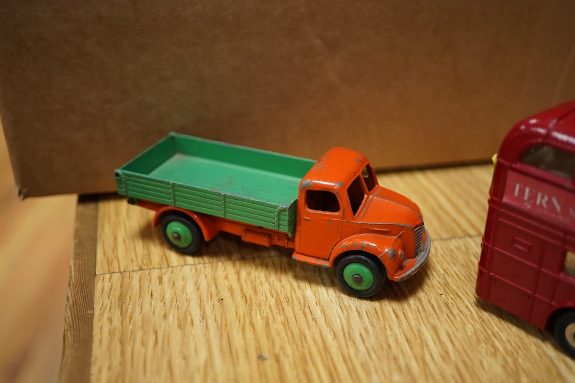 Twenty Dinky Toys, seven in reproduction boxes, including; Opel Kapitan, Austin A105 saloon, Packard Clipper Sedan, Euclid rear dump truck, Daimler ambulance, NCB electric van, etc.
